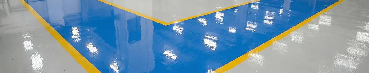A factory floor professionally covered and marked with epoxy flooring in Tacoma, WA