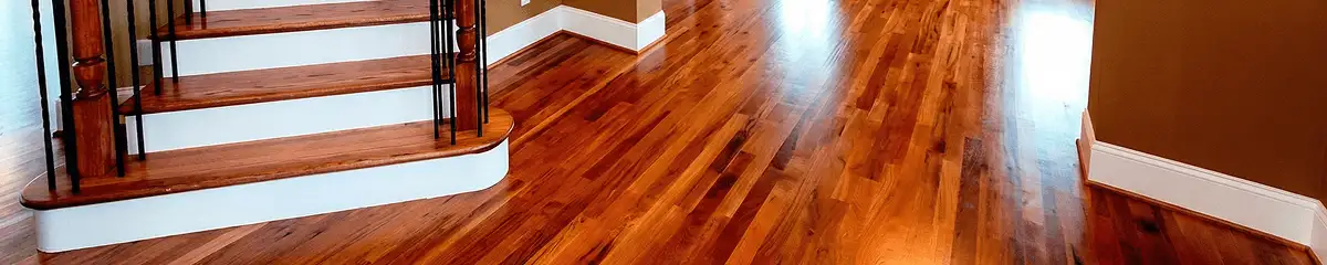 Base floor of a staircase with professionally restored wood flooring in Tacoma WA