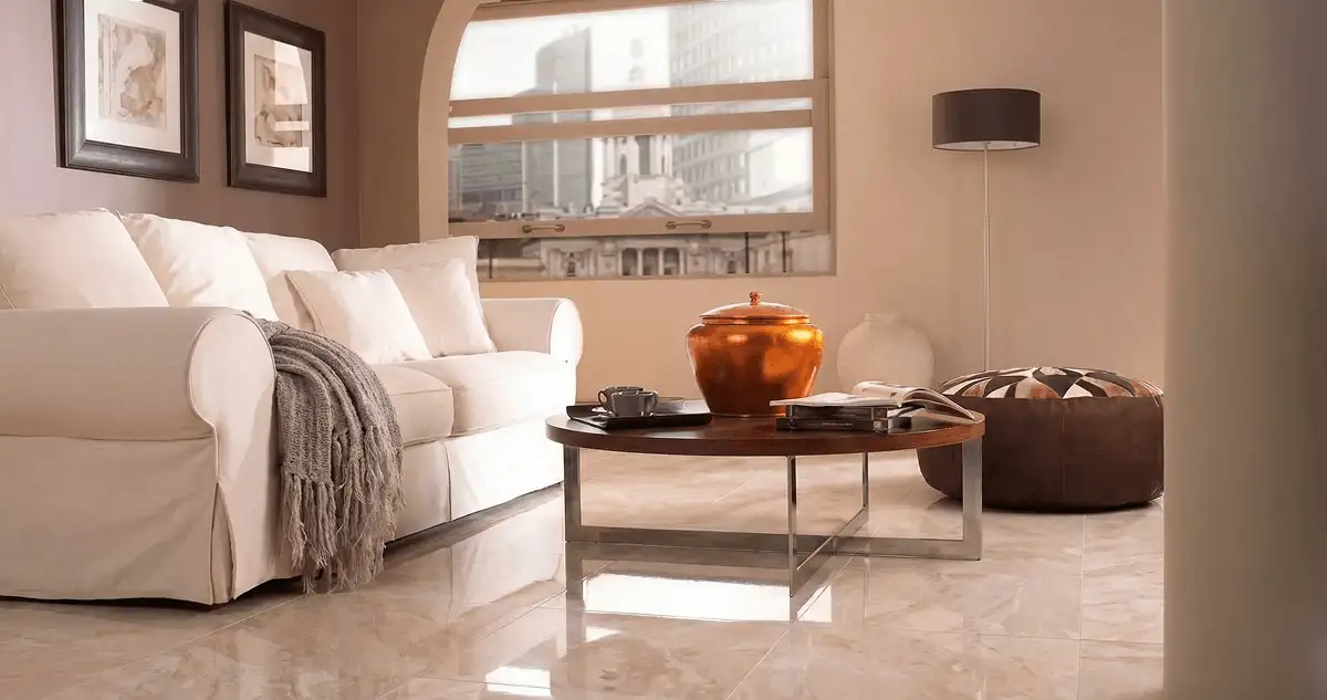 Modern living room with professionally installed marble flooring, a beige sofa, coffee table in Tacoma, WA