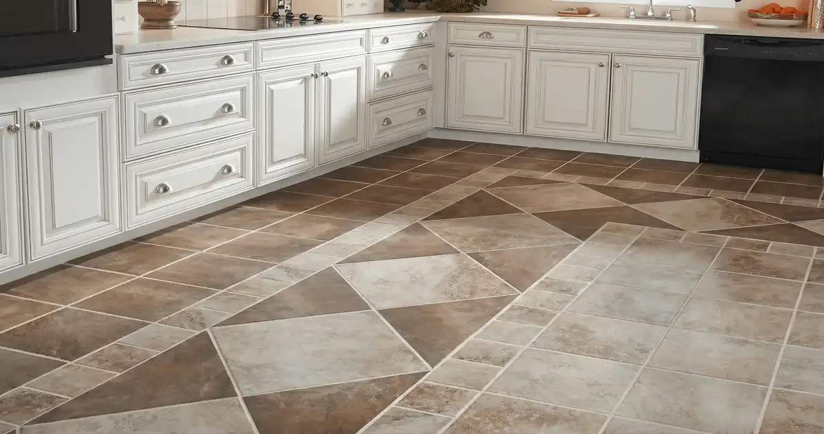 Kitchen with white cabinets and a professionally installed tile floor in Tacoma, WA